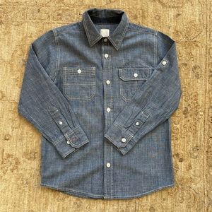 Button Down Chambray shirt. Kids size M, but could be worn as women’s XS.